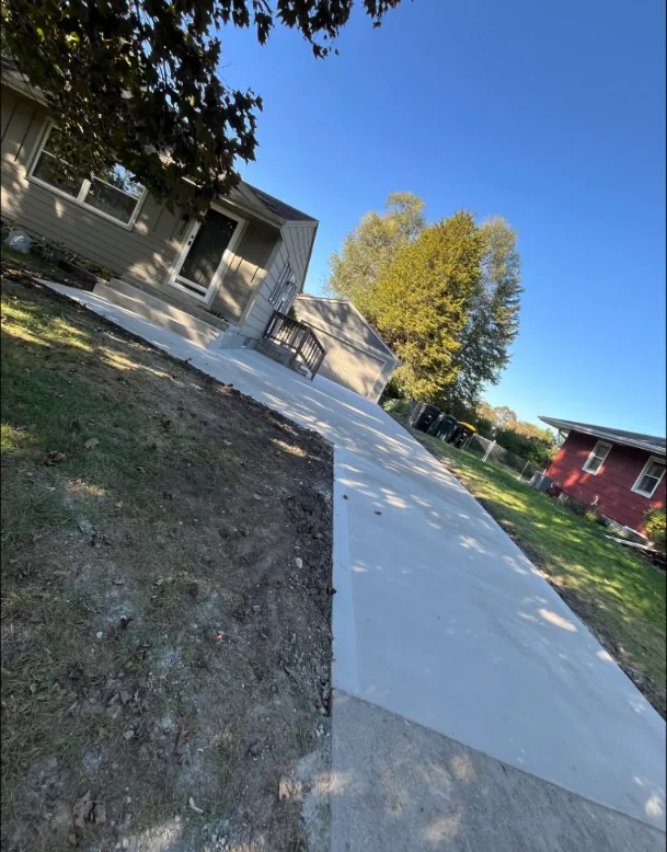 New concrete driveway seen from the house toward the street, Medina Concrete, Des Moines